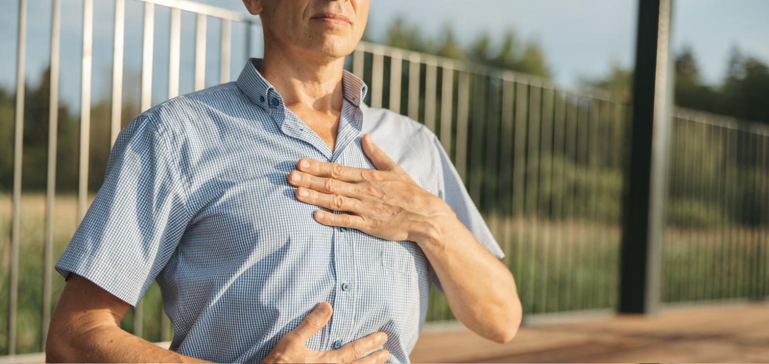 Client practicing a guided breathing exercise outdoors